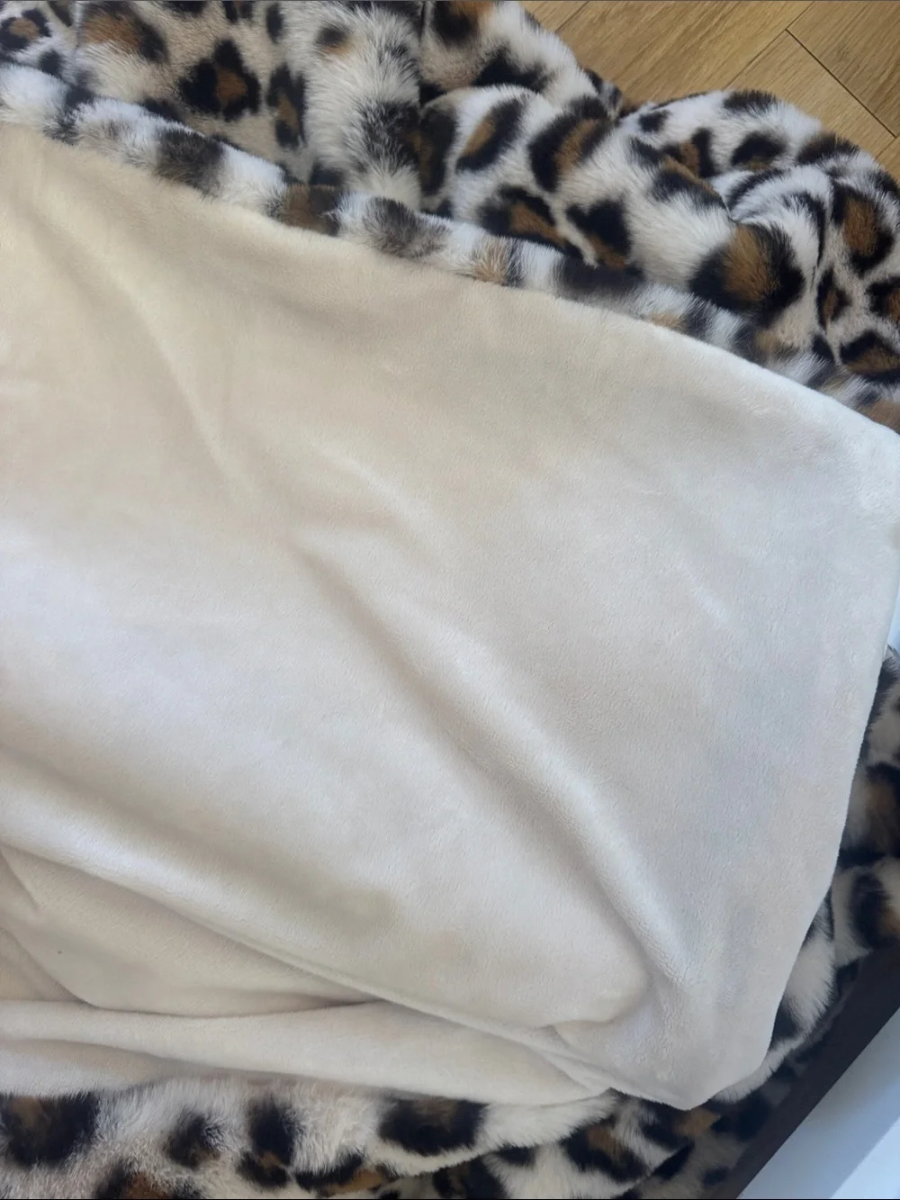 Anthropologie Chester faux fur leopard print throw blanket.
